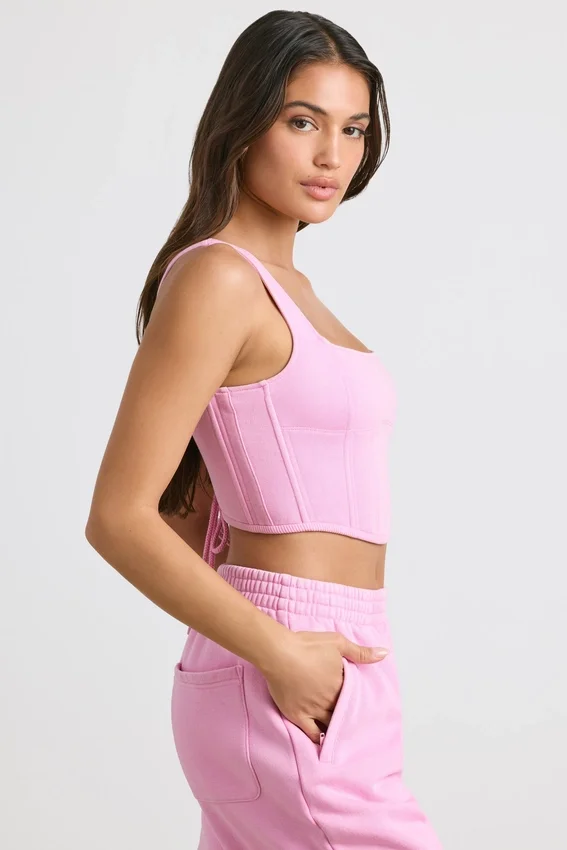 Top corto tipo corsé de jersey cepillado en rosa chicle