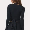 Top cruzado de jersey suave en negro