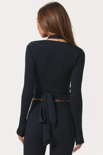 Top cruzado de jersey suave en negro