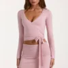 Top cruzado de punto suave en rosa palo