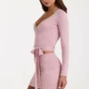 Top cruzado de punto suave en rosa palo