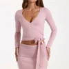 Top cruzado de punto suave en rosa palo