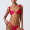 Braguitas de bikini atrevidas con adornos Volute en rosa frambuesa