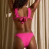 Top de bikini capri con nudo en fucsia
