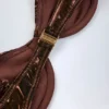 Top de bikini con aros Aluna en color bronce