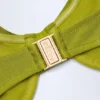 Top de bikini con aros y fruncido adornado con abalorios de Bruny en verde oliva