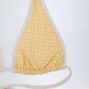 Top de bikini con cuello halter Morella en cuadros amarillos