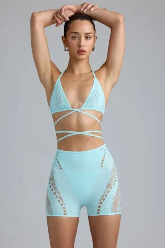 Top de bikini con tirantes cruzados y adornos Liberty en azul hielo