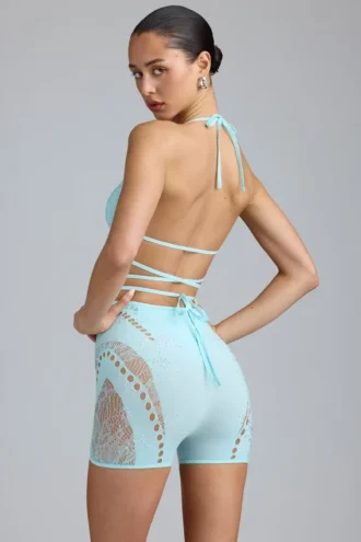 Top de bikini con tirantes cruzados y adornos Liberty en azul hielo
