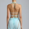 Top de bikini con tirantes cruzados y adornos Liberty en azul hielo