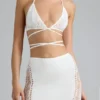 Top de bikini con tirantes cruzados y adornos Liberty en color marfil
