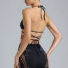 Top de bikini con tirantes cruzados y adornos Liberty en negro