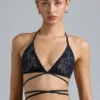 Top de bikini con tirantes cruzados y adornos Liberty en negro