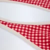 Top de bikini Morella con cuello halter en cuadros rojos