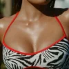 Top de bikini reversible con cuello halter Zuma en estampado de cebra