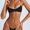 Top de bikini reversible con cuello halter Zuma en negro