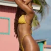 Braguitas de bikini con cordón y adornos Bali en amarillo dorado