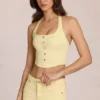 Top de denim con cuello halter estilo corsé de Elowis en amarillo limón