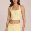 Top de denim con cuello halter estilo corsé de Elowis en amarillo limón