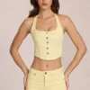 Top de denim con cuello halter estilo corsé de Elowis en amarillo limón