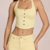Top de denim con cuello halter estilo corsé de Elowis en amarillo limón