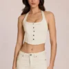 Top de denim con cuello halter estilo corsé de Elowis en color marfil