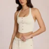 Top de denim con cuello halter estilo corsé de Elowis en color marfil