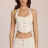 Top de denim con cuello halter estilo corsé de Elowis en color marfil