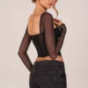 Top de manga larga con corsé Zella en negro