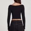 Top de manga larga con cuello barco Charliane en Modal, color negro
