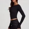 Top de manga larga con cuello barco Charliane en Modal, color negro