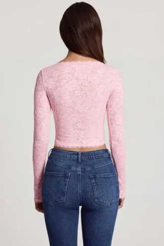 Top de manga larga con escote pronunciado de encaje transparente Lioren en rosa
