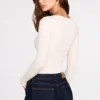 Top de manga larga con fruncidos de modal acanalado Luisa en color marfil