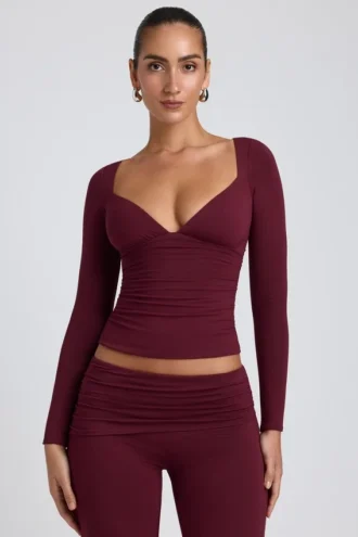 Top de manga larga con fruncidos Emry Modal en color ciruela