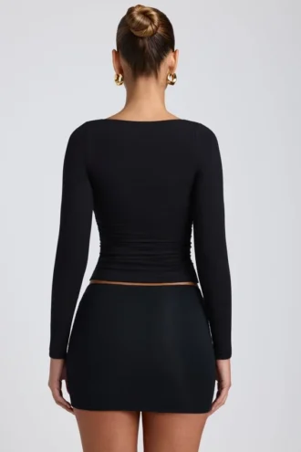 Top de manga larga con fruncidos Emry Modal en negro