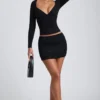 Top de manga larga con fruncidos Emry Modal en negro