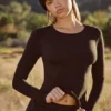 Top de manga larga Soft Active en negro