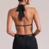 Top drapeado con cuello vuelto Zenna en negro