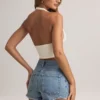 Top Drew de modal con cuello halter en blanco