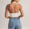 Top Drew de modal con cuello halter en blanco