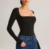 Top Kaia de manga larga con cuello cuadrado en modal negro
