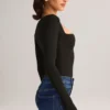 Top Kaia de manga larga con cuello cuadrado en modal negro
