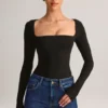 Top Kaia de manga larga con cuello cuadrado en modal negro