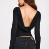 Top sin espalda de manga larga de jersey transparente Nari en negro