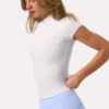 Top Soft Active con cremallera de un cuarto en color Milk