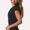 Top Soft Active con cremallera de un cuarto en negro