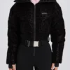 Traje de esquí impermeable con cinturón y capas en leopardo negro