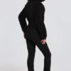 Traje de esquí impermeable con cinturón y capas en leopardo negro