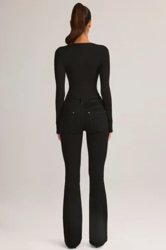 Vaqueros acampanados de talle medio Lone Denim en negro