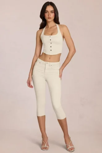 Vaqueros capri de talle medio Anessa en color marfil